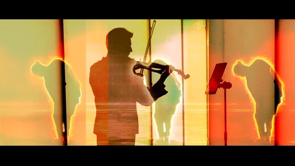 An abstract overlaid image of dancers with a man playing the electric viola in silhouette.